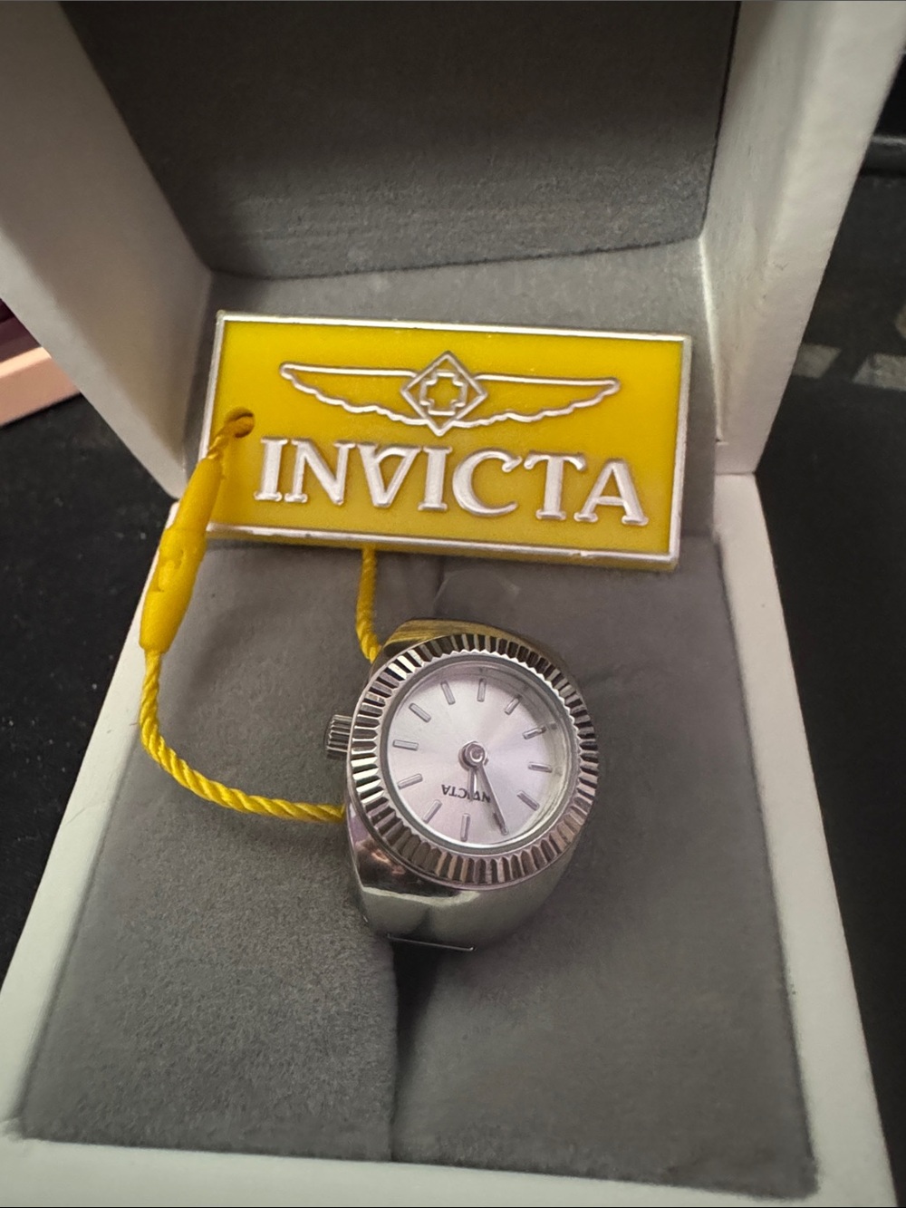 Invicta Silver Tone Ladies Ring Watch with White Dial and Yellow Tag